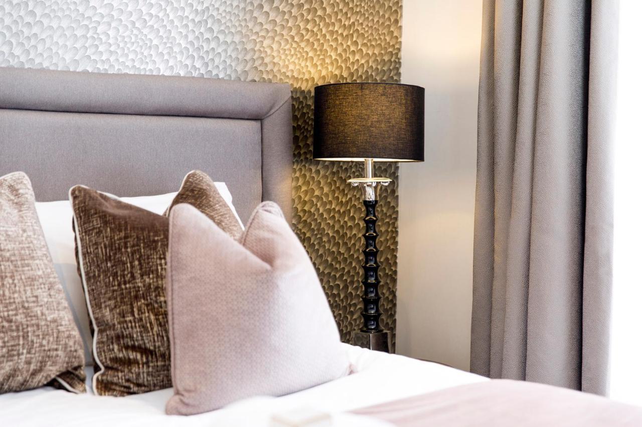 Lanelay Hall Hotel & Spa Hensol Exterior foto A bedroom at The Ivy Collection